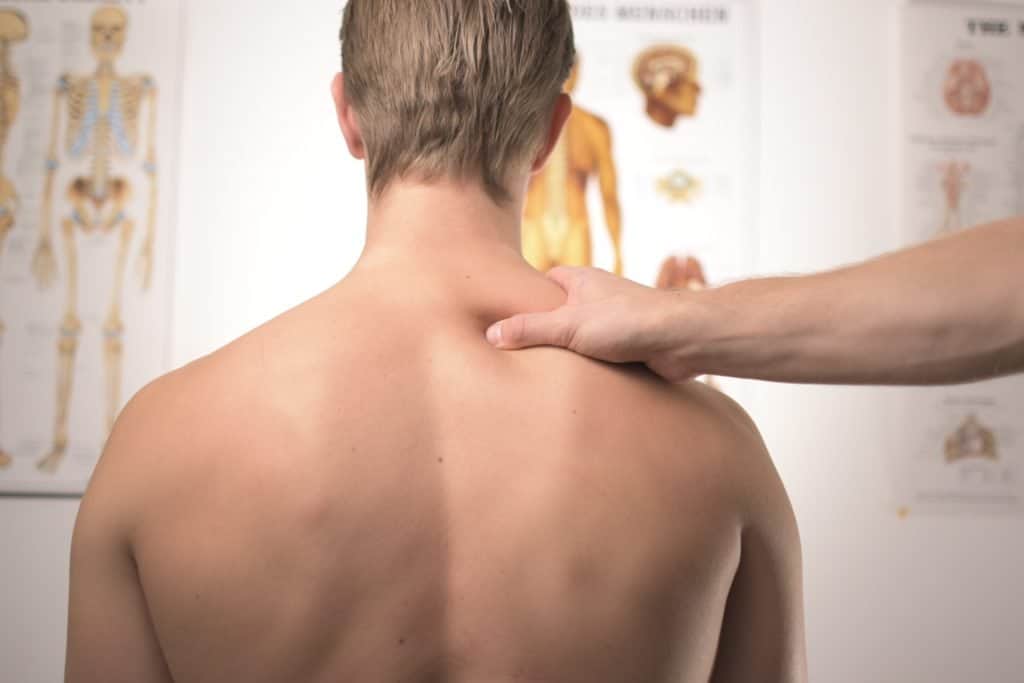 man receiving a back massage