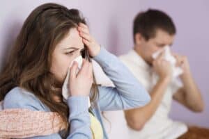 sick-woman-and-man-have-cold-flu-and-high-fever-